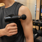 Pistola masajeadora muscular — lifestyle