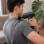 Pistola de masaje muscular — lifestyle